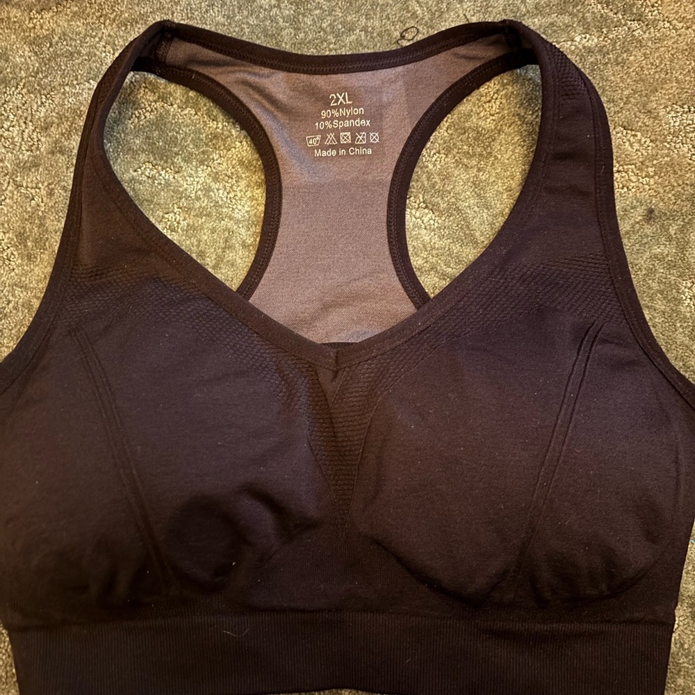 Sports bras in various colors size 2x. Some NWT some preloved.